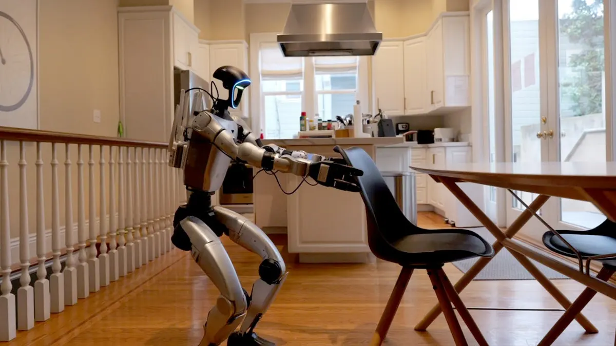 A Gatsby humanoid robot cleaning a San Francisco kitchen during the company's first US consumer apartment visit.