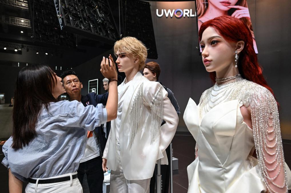 Close-up of a customized female U1 with red hair and silicone skin at the launch.